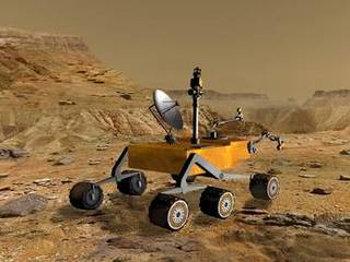 NASA's Mars Science Laboratory travels near a canyon on Mars in this artist's concept. The mission is under development for launch in 2009 and a precision landing on Mars in 2010.