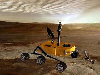 Sunset on Mars catches NASA's Mars Science Laboratory in the foreground in this artist's concept. The mission is under development for launch in 2009 and a precision landing on Mars in 2010.