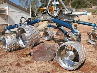 Scarecrow, a mobility-testing model for NASA's Mars Science Laboratory, easily traverses large rocks in the Mars Yard testing area at NASA's Jet Propulsion Laboratory.