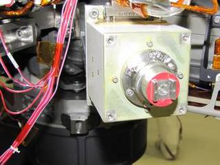 The sensor head on the Alpha Particle X-ray Spectrometer instrument was installed during testing at NASA's Jet Propulsion Laboratory. The instrument is part of the Curiosity rover, which will fly on NASA's Mars Science Laboratory mission. For perspective, the sensor head is 7.8 centimeters, or about 3 inches tall.