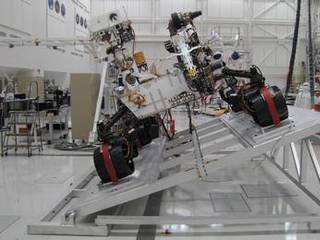 The Mast Camera (Mastcam) on NASA's Mars rover Curiosity has two rectangular "eyes" near the top of the rover's remote sensing mast. The mast is on the right side of the rover, which puts it on the left side of this image taken from in front of the rover.
