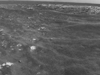 NASA's Mars Exploration Rover Opportunity recorded this view of a crater informally named "Freedom 7" shortly before the 50th anniversary of the first American in space: astronaut Alan Shepard's flight in the Freedom 7 spacecraft.