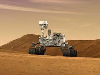 This artist concept features NASA's Mars Science Laboratory Curiosity rover, a mobile robot for investigating Mars' past or present ability to sustain microbial life.
