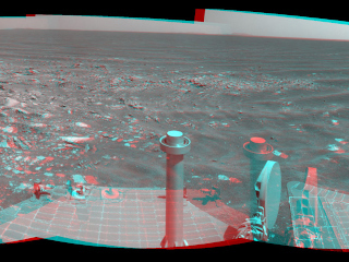 NASA's Mars Exploration Rover Opportunity used its navigation camera to take the exposures combined into this stereo view of a wee crater, informally named "Skylab," along the rover's route.
