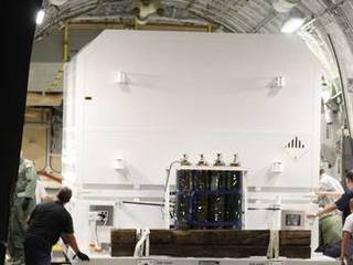 A photo of the Curiosity rover being unloaded from a C-17 transport plane.