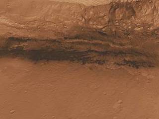 This oblique view of the lower mound in Gale crater on Mars shows an area of top scientific interest for the Mars Science Laboratory mission.