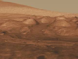This oblique view of the lower mound in Gale crater shows layers of rock that preserve a record of environments on Mars.