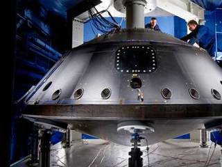 This image from July 2008 shows the aeroshell for NASA's Mars Science Laboratory while it was being worked on by spacecraft technicians at Lockheed Martin Space Systems Company near Denver.