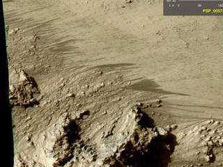 This series of images shows warm-season features that might be evidence of salty liquid water active on Mars today.