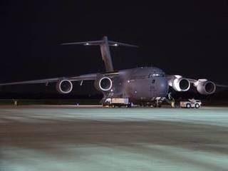 The first three elements for NASA's Mars Science Laboratory (MSL) arrive at NASA Kennedy Space Center's Shuttle Landing Facility aboard an Air Force C-17 cargo plane.