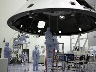 At the Payload Hazardous Servicing Facility at NASA's Kennedy Space Center in Florida, technicians process the backshell for NASA's Mars Science Laboratory (MSL).