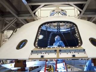 In the Payload Hazardous Servicing Facility at NASA's Kennedy Space Center in Florida, technicians process the backshell for NASA's Mars Science Laboratory (MSL).