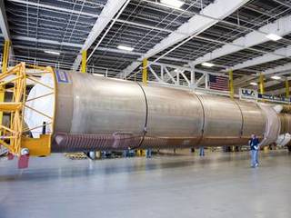 The Atlas V first stage to support the Mars Science Laboratory (MSL) mission is positioned inside the Atlas Spaceflight Operations Center on Cape Canaveral Air Force Station in Florida.