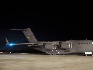 NASA's Mars Science Laboratory (MSL) rover, known as Curiosity, arrives at the Shuttle Landing Facility at NASA's Kennedy Space Center in Florida aboard an Air Force C-17 cargo plane.