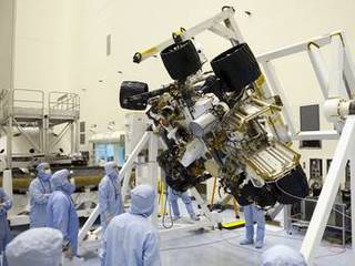 Technicians in the Payload Hazardous Servicing Facility at NASA's Kennedy Space Center in Florida put NASA's Mars Science Laboratory (MSL) rover, known as Curiosity, through a series of rotation tests.
