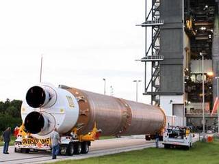 The first stage of the Atlas V rocket for NASA's Mars Science Laboratory (MSL) mission arrives at the Vertical Integration Facility at Space Launch Complex 41 on Cape Canaveral Air Force Station.