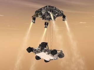 This artist's concept shows the sky crane maneuver during the descent of NASA's Curiosity rover to the Martian surface.