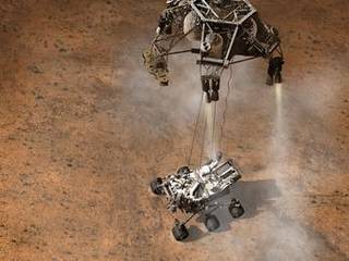 This artist's concept depicts the moment that NASA's Curiosity rover touches down onto the Martian surface.