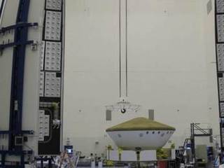Preparations are under way to enclose NASA's Mars Science Laboratory in an Atlas V rocket payload fairing in this photograph from inside the Payload Hazardous Servicing Facility at NASA's Kennedy Space Center in Florida