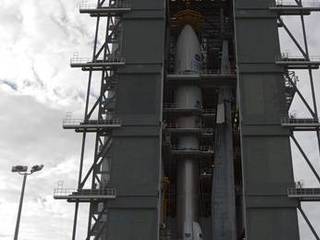 In the Vertical Integration Facility at Space Launch Complex 41, the payload fairing containing NASA's Mars Science Laboratory spacecraft was attached to its Atlas V rocket on Nov. 3, 2011.