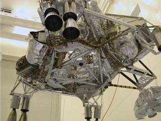 The descent stage of NASA's Mars Sciecnce Laboratory spacecraft is being lifted during assembly of the spacecraft in this photograph taken inside the Payload Hazardous Servicing Facility at NASA Kennedy Space Center, Fla.
