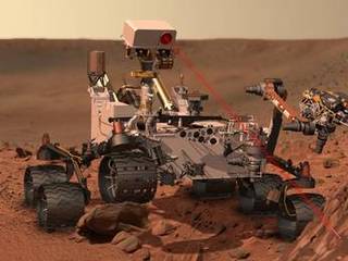 This artist's concept depicts the rover Curiosity, of NASA's Mars Science Laboratory mission, as it uses its Chemistry and Camera (ChemCam) instrument to investigate the composition of a rock surface.