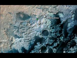 A green star marks the location of NASA's Curiosity Mars rover after a drive on the mission's 957th Martian day, or sol, (April 16, 2015).  The map covers an area about 1.25 miles (2 kilometers) wide.