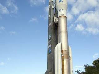 On Cape Canaveral Air Force Station in Florida, the 197-foot-tall United Launch Alliance Atlas V rocket rolls to the launch pad at Space Launch Complex 41.