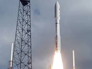 With NASA's Mars Science Laboratory (MSL) spacecraft sealed inside its payload fairing, the United Launch Alliance Atlas V rocket lifts off from Space Launch Complex-41 on Cape Canaveral Air Force Station in Florida at 10:02 a.m. EST Nov. 26.