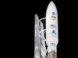 With NASA's Mars Science Laboratory (MSL) spacecraft sealed inside its payload fairing, the United Launch Alliance Atlas V rocket stands ready for launch at Space Launch Complex-41 on Cape Canaveral Air Force Station in Florida.