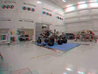 NASA's Curiosity rover and its rocket-powered descent vehicle pose for a portrait at JPL's Spacecraft Assembly Facility.