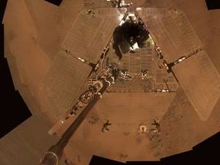 This self-portrait from Opportunity shows dust accumulation on the rover's solar panels as the mission approached its fifth Martian winter.