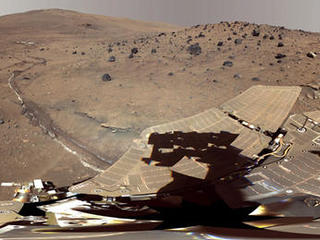 This beautiful scene reveals a tremendous amount of detail in Spirit's surroundings at a place called "Winter Haven," where the rover spent many months parked on a north-facing slope in order to keep its solar panels pointed toward the sun for the winter.  During this time, it captured several images to create this high resolution panorama.
