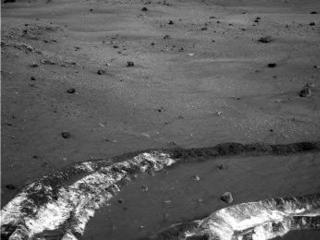 While driving eastward toward the northwestern flank of "McCool Hill," Spirit's wheels churned up the largest amount of bright soil discovered to that point in the mission.