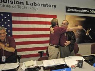 Mars Reconnaissance Orbiter Mission Team Members Celebrate Orbit Insertion Success