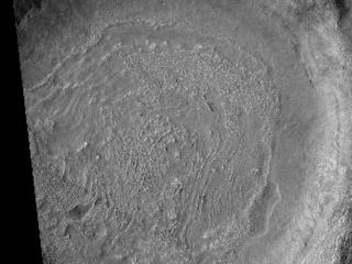 Crater in Thaumasia Fossae