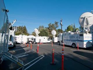 Satellite news trucks crowd the parking lots at NASA's Jet Propulsion Laboratory in Pasadena, Calif., on Aug. 5, 2012, in preparation for the Curiosity rover's landing on Mars.
