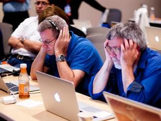Scientists listen intently for status updates prior to Curiosity's landing.