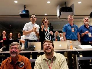 Excitement builds at NASA's Jet Propulsion Laboratory when news of a successful parachute deployment from the Mars Science Laboratory spacecraft reaches the science team.