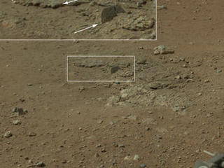 This color image from NASA's Curiosity rover shows an area excavated by the blast of the Mars Science Laboratory's descent stage rocket engines