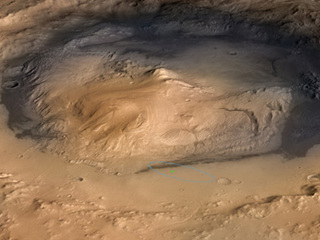 NASA's Curiosity rover landed in the Martian crater known as Gale Crater, which is approximately the size of Connecticut and Rhode Island combined.