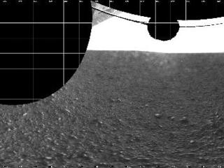 The Curiosity engineering team created this view from images taken by NASA's Curiosity rover rear hazard avoidance cameras underneath the rover deck on Sol 0.