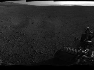 This 360-degree image shows a complete, full-resolution panorama around NASA's Curiosity rover, taken by the Navigation cameras.