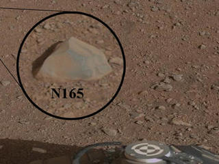 This mosaic image with a close-up inset, taken prior to the test, shows the rock chosen as the first target for NASA's Curiosity rover to zap with its Chemistry and Camera (ChemCam) instrument.
