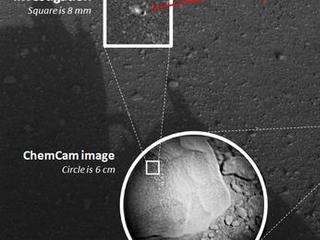 This composite image, with magnified insets, depicts the first laser test by the Chemistry and Camera, or ChemCam,