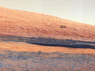 This image taken by the Mast Camera (MastCam) on NASA's Curiosity rover highlights the interesting geology of Mount Sharp, a mountain inside Gale Crater, where the rover landed.