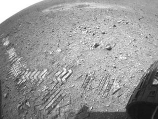 This image shows a close-up of track marks left by NASA's Curiosity rover.