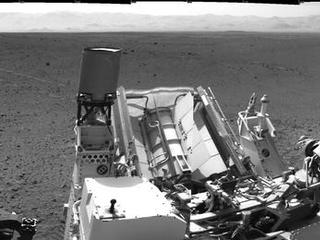 NASA's Mars rover Curiosity drove about 70 feet (about 21 meters) on the mission's 21st Martian day, or sol (Aug. 30, 2012) and then took images with its Navigation Camera that are combined into this scene, which inclues the fresh tracks.
