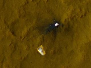 This color view of the parachute and back shell that helped deliver NASA's Curiosity rover to the surface of the Red Planet was taken by the High-Resolution Imaging Science Experiment (HiRISE) camera on NASA's Mars Reconnaissance Orbiter.
