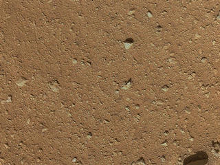 The reclosable dust cover on Curiosity's Mars Hand Lens Imager (MAHLI) was opened for the first time during the 33rd Martian day, or sol, of the rover's mission on Mars (Sept. 8, 2012), enabling MAHLI to take this image.